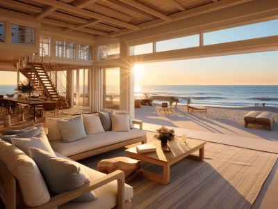 Beach House With White Couches, A Fireplace, And A Large View Of The Beach