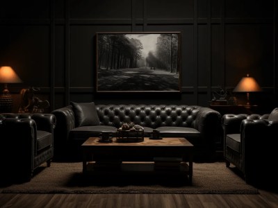 Black Couch And Chair Sitting In Front Of A Dark Wall