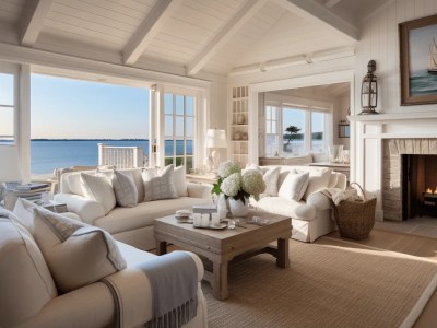 Living Room Of A Beach House With White Furniture And Fireplace